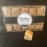 Savor the iconic flavor of our bite-sized baklava, freshly prepared for our local aficionados.